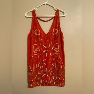 Embroidered and embellished coral colored Free People dress